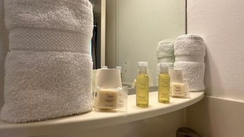 Shower, free toiletries, hair dryer, towels