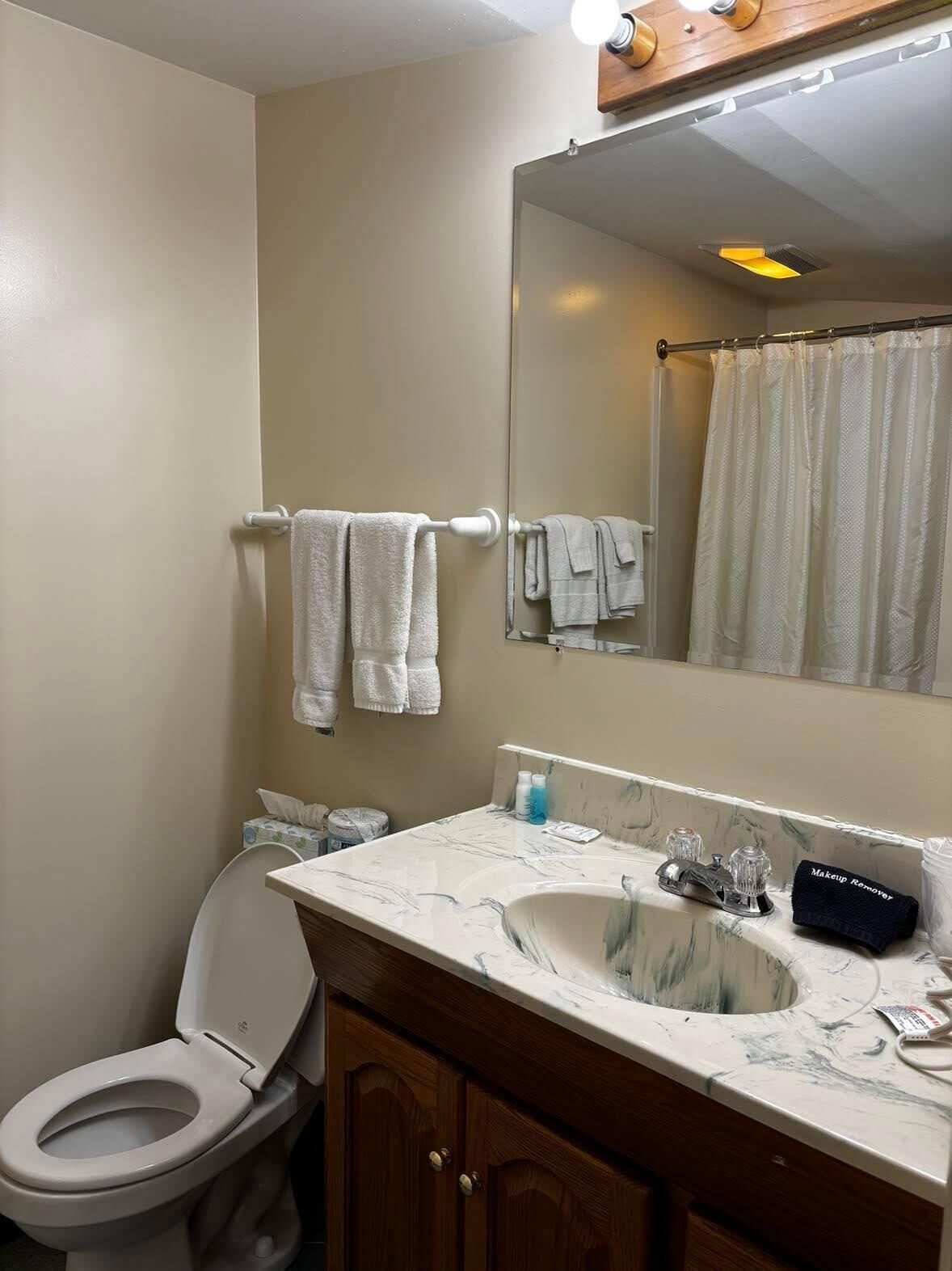 Hair dryer, towels, soap, toilet paper