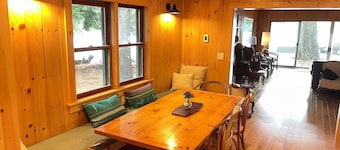 Lakefront 4-bedroom property with spectacular views of Blue Mountain Lake.