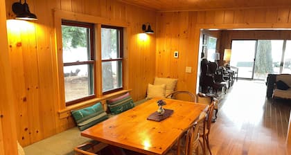 Lakefront 4-bedroom property with spectacular views of Blue Mountain Lake.