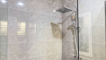 Shower, eco-friendly toiletries, towels, soap