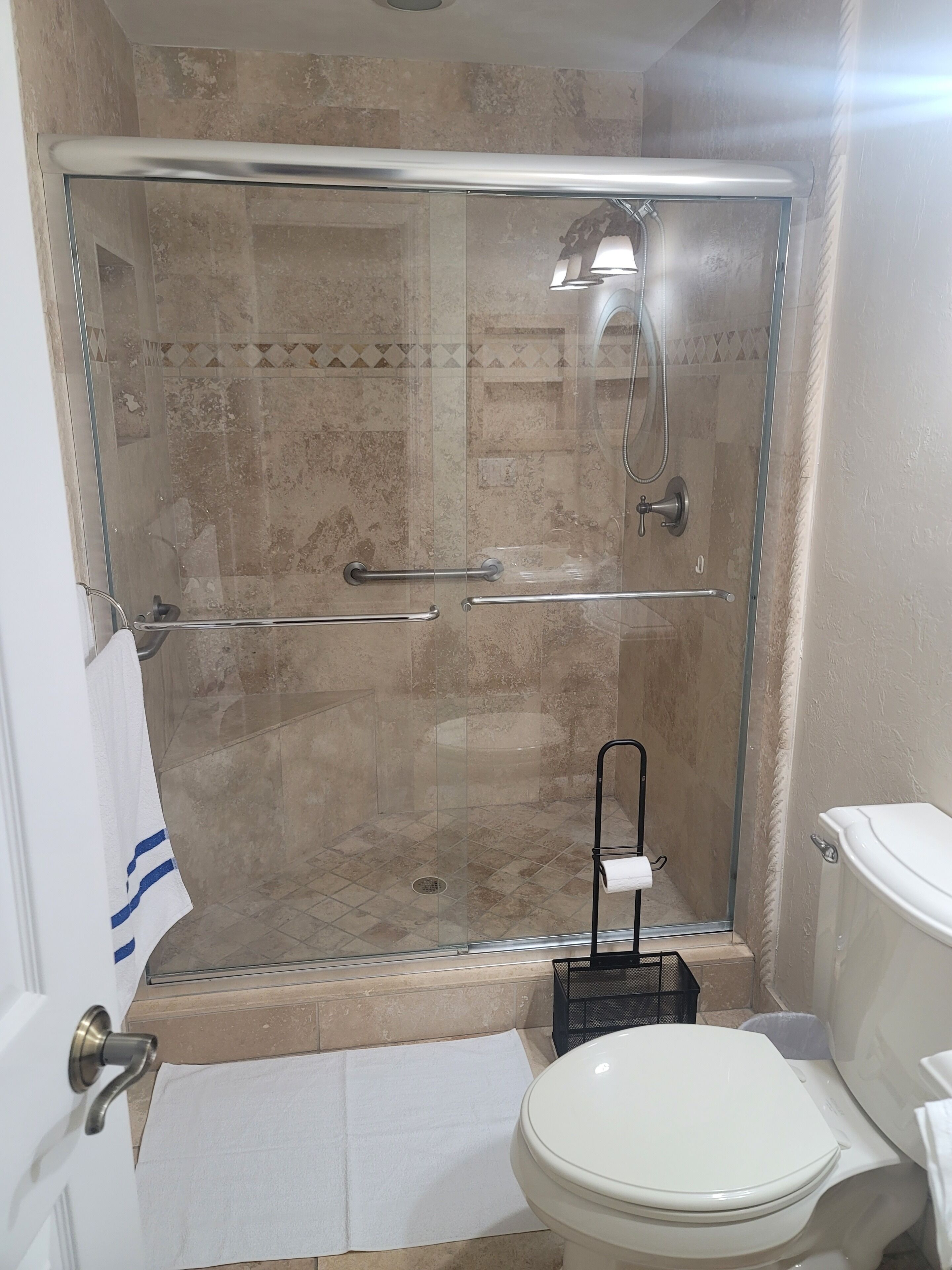Shower, jetted tub, towels, soap