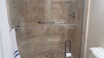 Shower, jetted tub, towels, soap