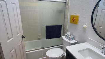 Hair dryer, towels, soap, toilet paper