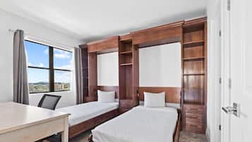 2 habitaciones, caja de seguridad en la habitación y escritorio