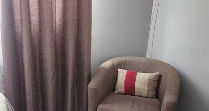 Cozy 2-bedroom condo near Savannah Port of Spain with Central AC , free parking