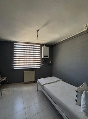 Departamento, 1 habitación, para fumadores, vista a la ciudad | 1 habitación