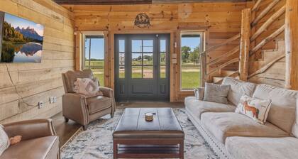 77-acre river ranch with farmhouse spa, game room, ponds, trails and family fun.