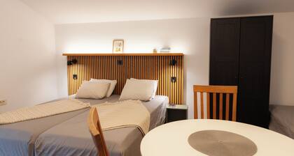 A comfortable family room with secure parking near the city center.