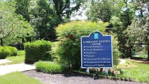 A sign listing various destinations including South Hampton, North Hampton, Brighton, Margate, Gloucester Pt. & Terrace, Windermere by the Sea, and Richmond Park Bldg. 1 to 21. - Cumberland Terrace 2E (Myrtle Beach)