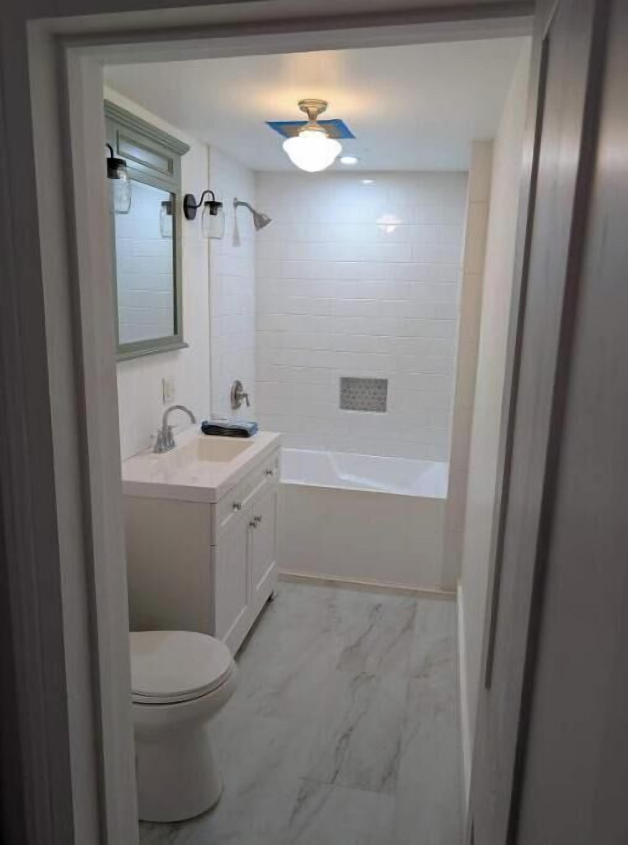 Shower, towels, soap, toilet paper