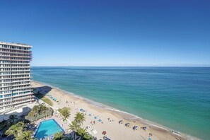 A hotel with a pool, beach, and ocean view. - Lovely Beachfront Condo w/Balcony overlooking the Atlantic Ocean (Fort Lauderdale)
