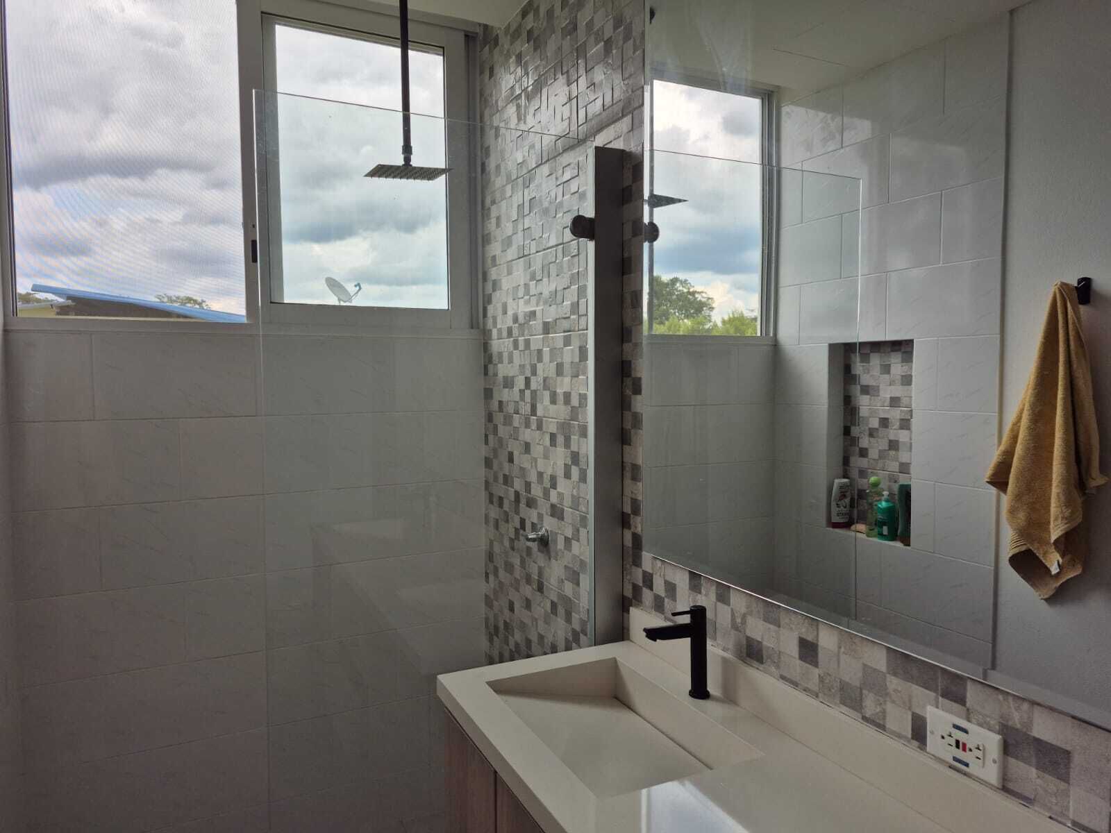 Shower, towels, soap, toilet paper