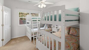 A child's bedroom with bunk beds, a window, and a ceiling fan. - Main Channel Views, 3 Heated Pools & Gated Resort (Lake Ozark)