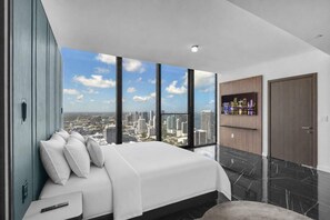 The first of two king suites, boasting a TV & an ensuite bath​ - E11EVEN 61st Floor Penthouse | 2BR + Balcony (Miami)