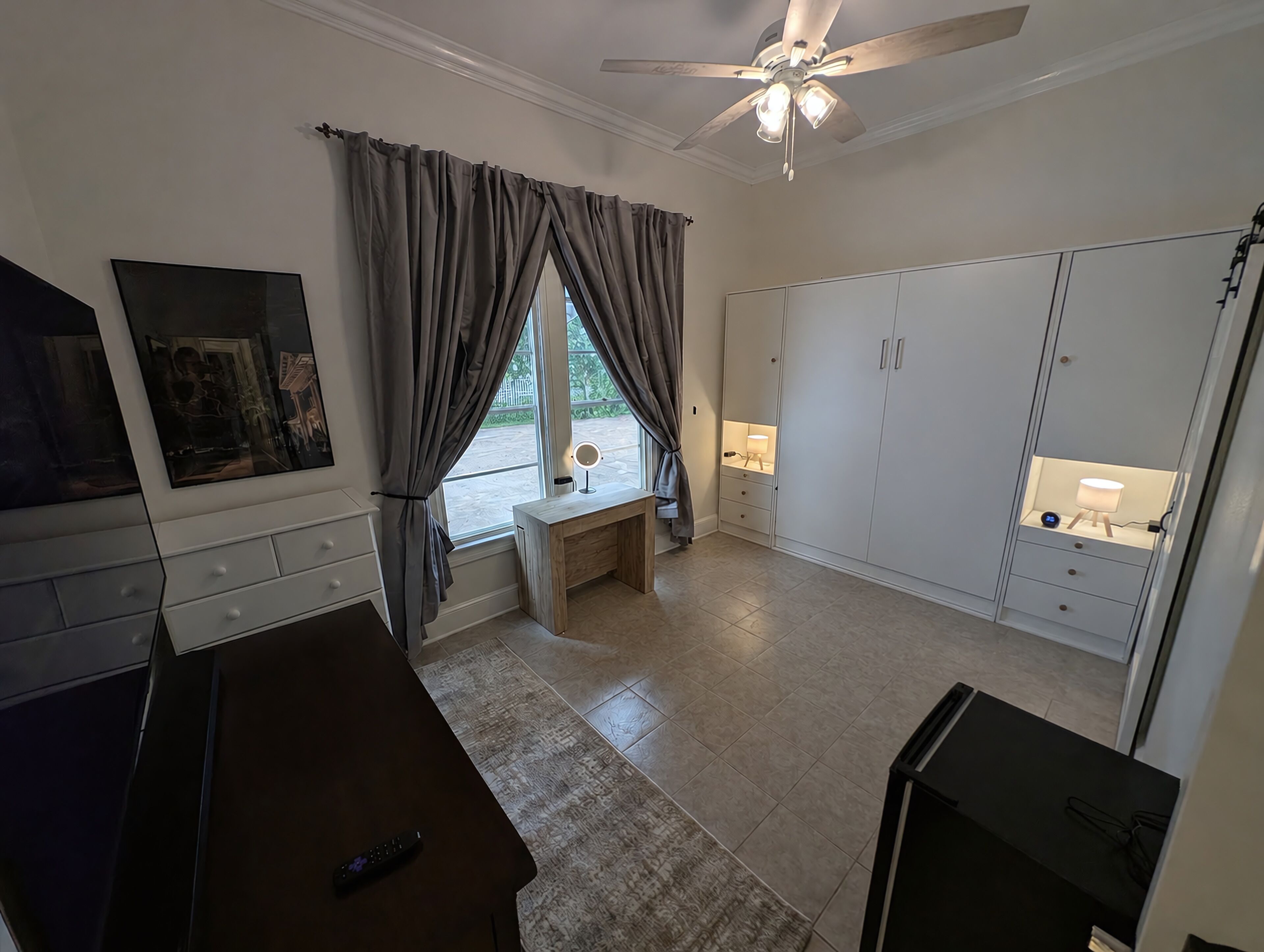 Desk, laptop workspace, blackout curtains, iron/ironing board