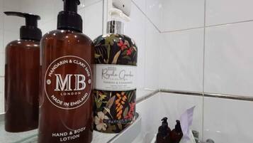 Shower, hair dryer, shampoo