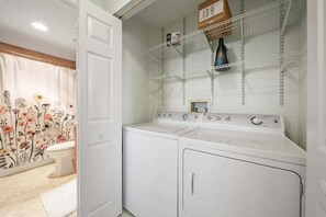 This setup makes it easy for guests to handle laundry without taking up extra space in the unit. - Oceanfront, Resort Pools & Private Beach Access | Surf Club 1502 (Palm Coast)