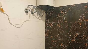Double Room | Bathroom | Shower, free toiletries, towels, soap