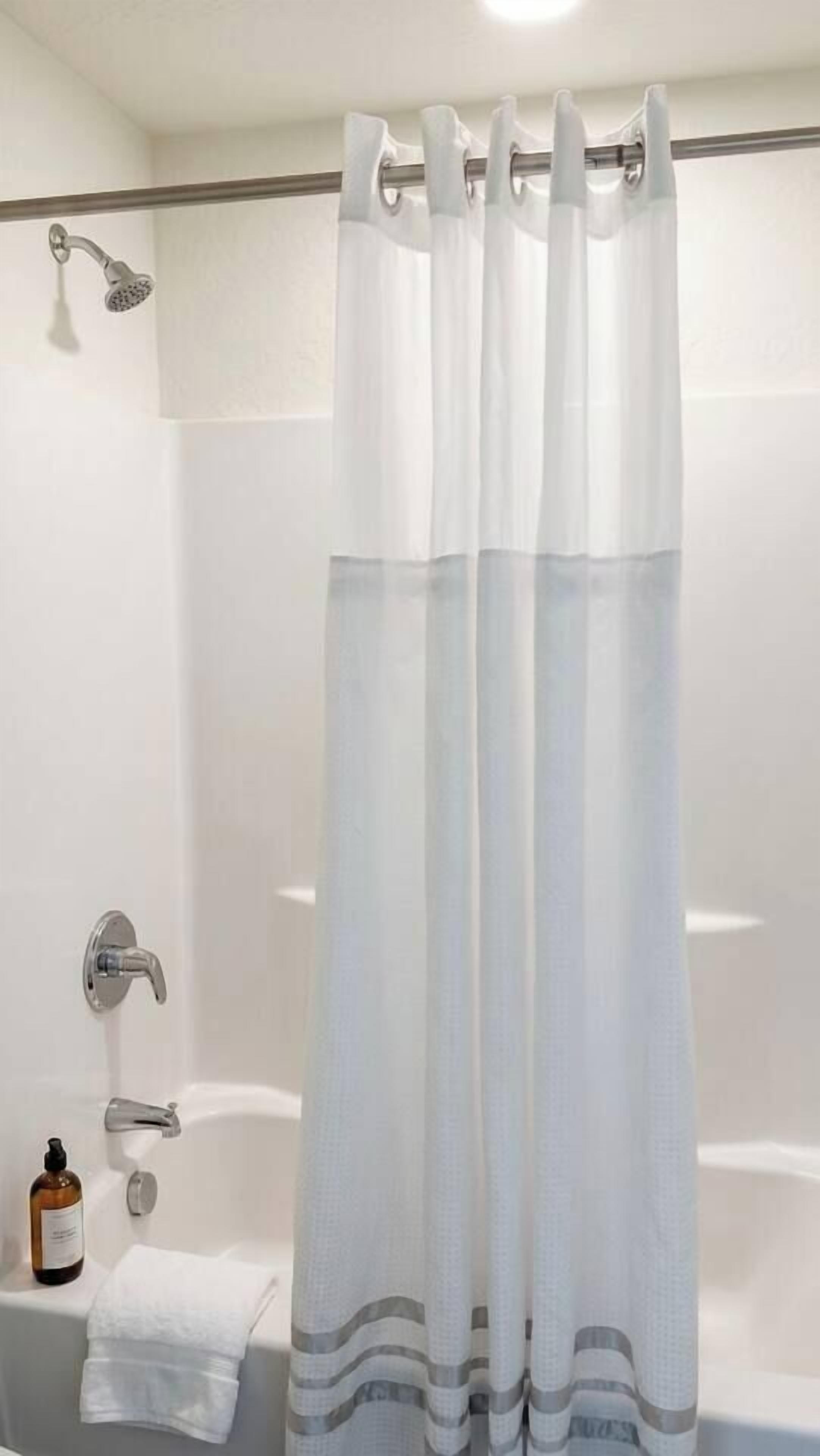 Hair dryer, towels, soap, shampoo