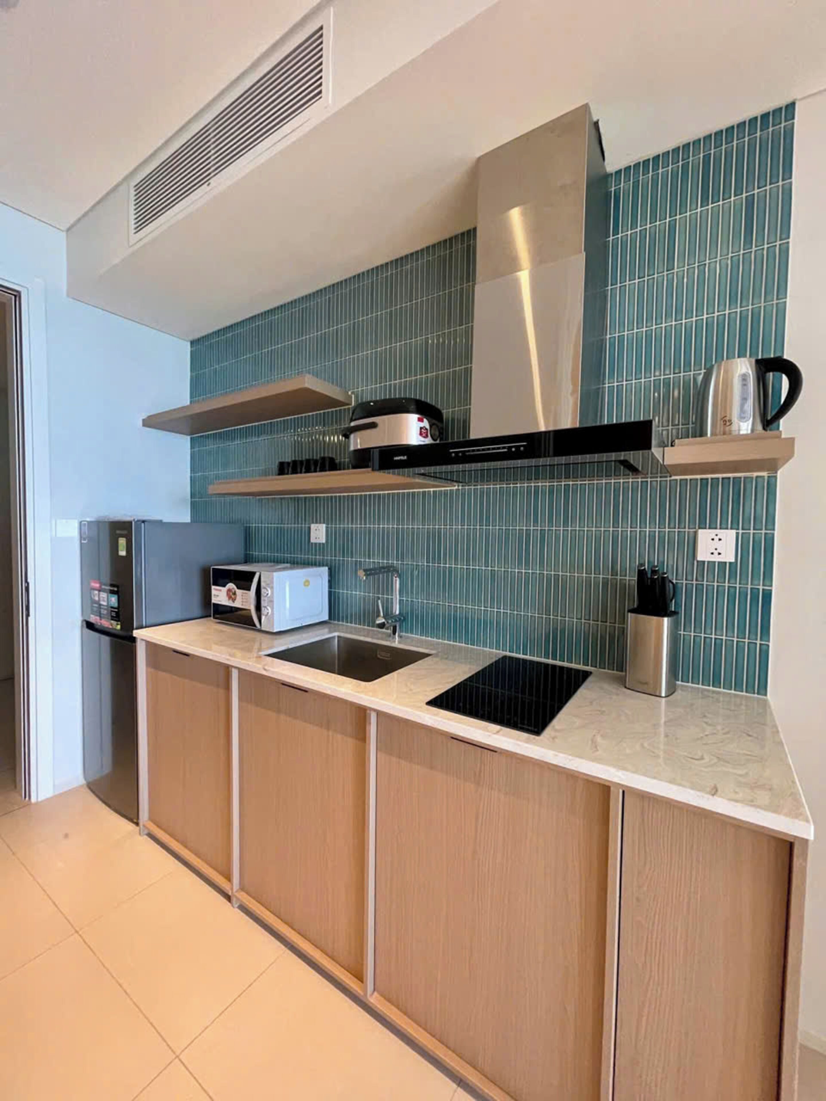 Luxury Apartment, Beach View | Private kitchen | Full-size fridge, microwave, stovetop, cookware/dishes/utensils