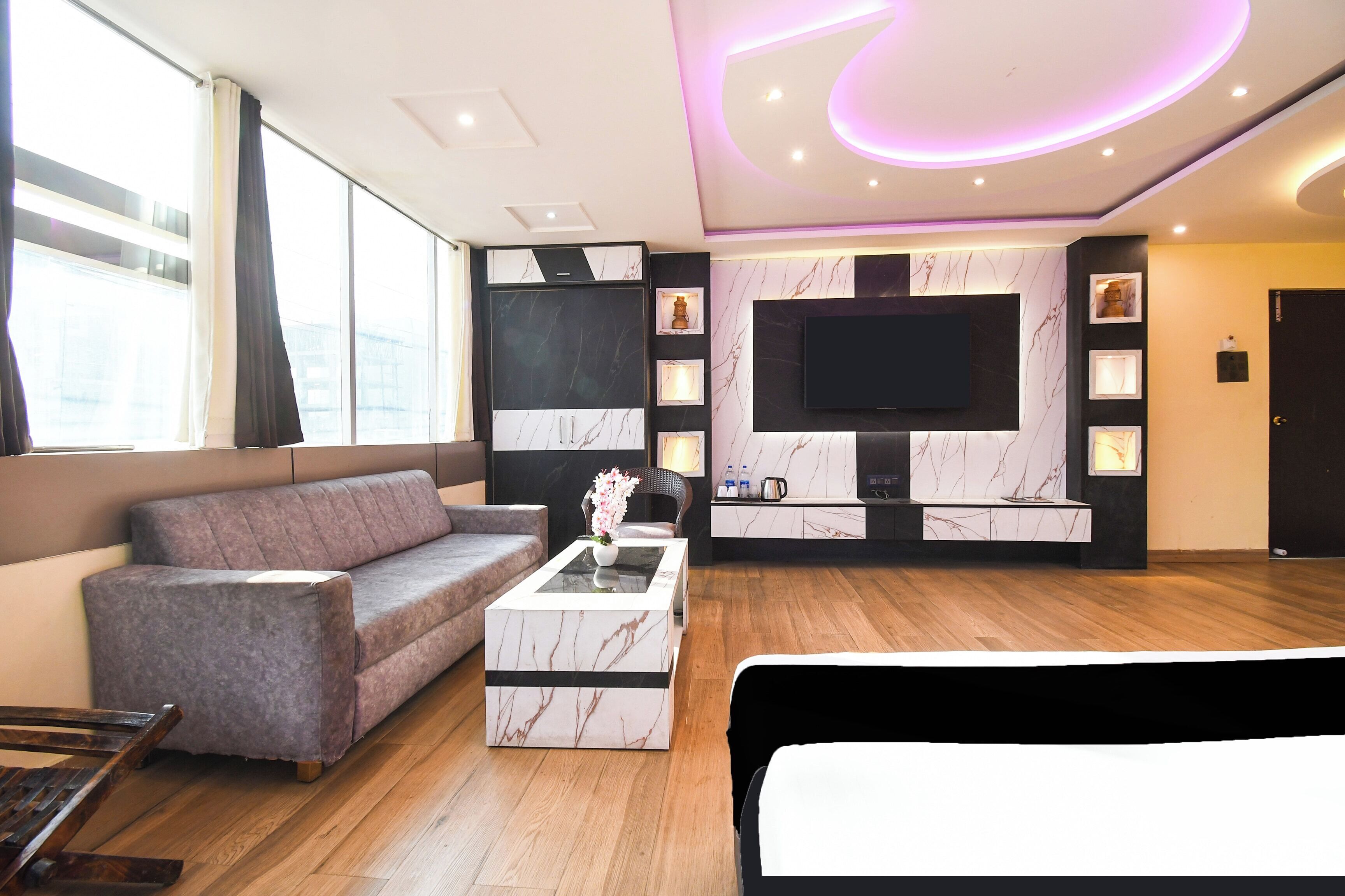 Deluxe Triple Room | Living area