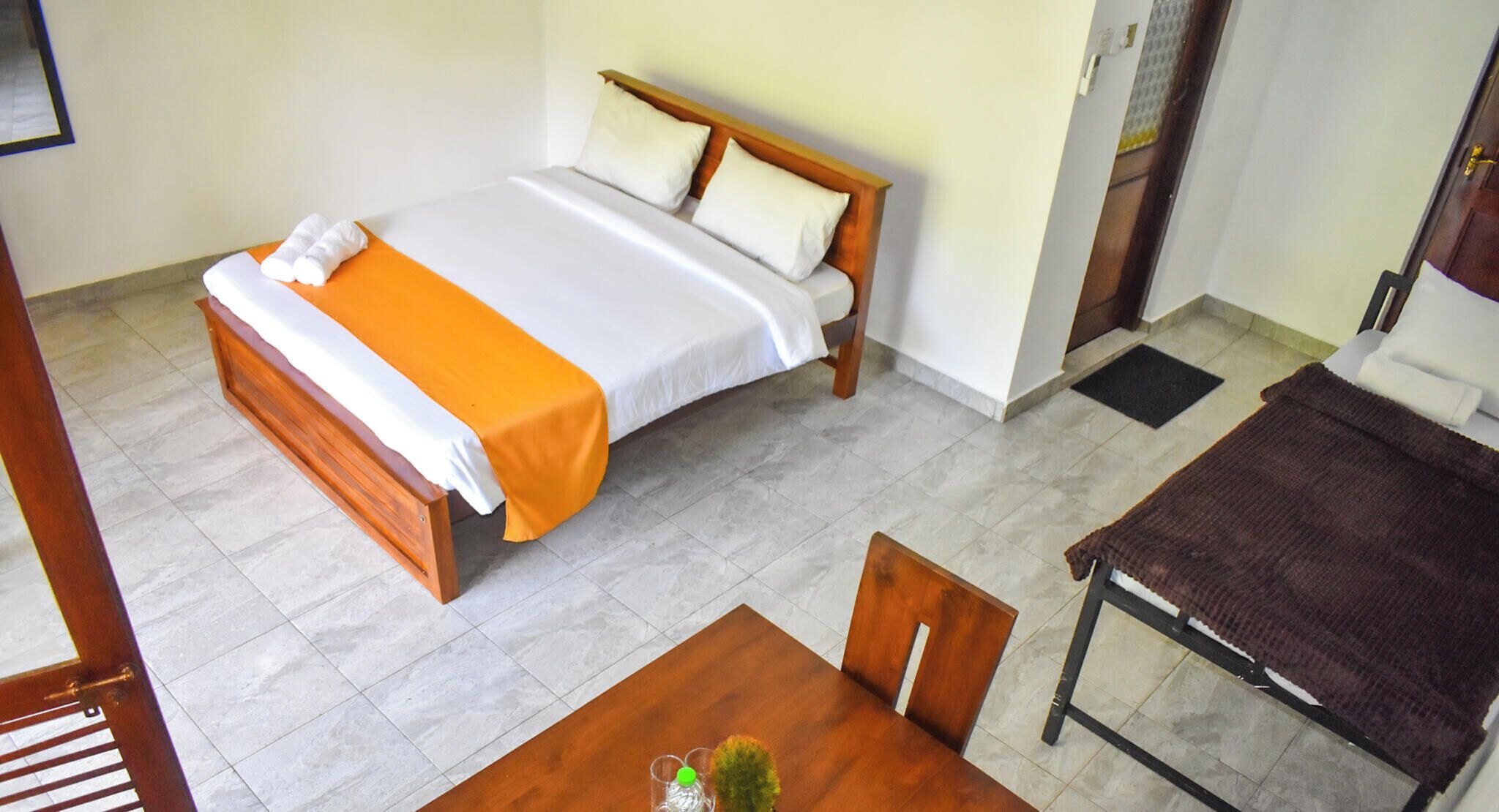 Triple Room, River View | Iron/ironing board (on request), WiFi (free), bed sheets