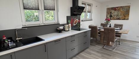 Coffee/tea maker, fridge, microwave, oven