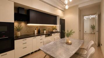 Apartamento Confort, Aire acondicionado, vistas a la ciudad | Cocina privada