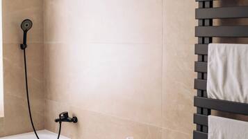 Hair dryer, towels, soap, shampoo