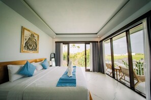 Kahden hengen deluxe-huone, näköala puutarhaan | Silitysrauta/-lauta, ilmainen Wi-Fi