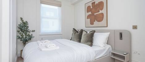 2 habitaciones, tabla de planchar con plancha, internet y ropa de cama