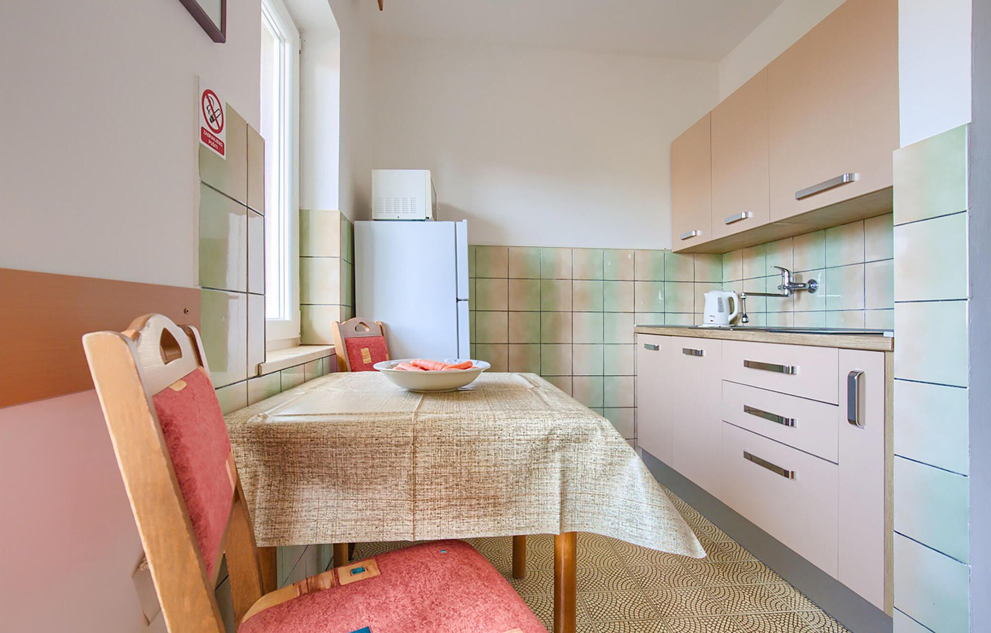 Fridge, microwave, stovetop, cookware/dishes/utensils