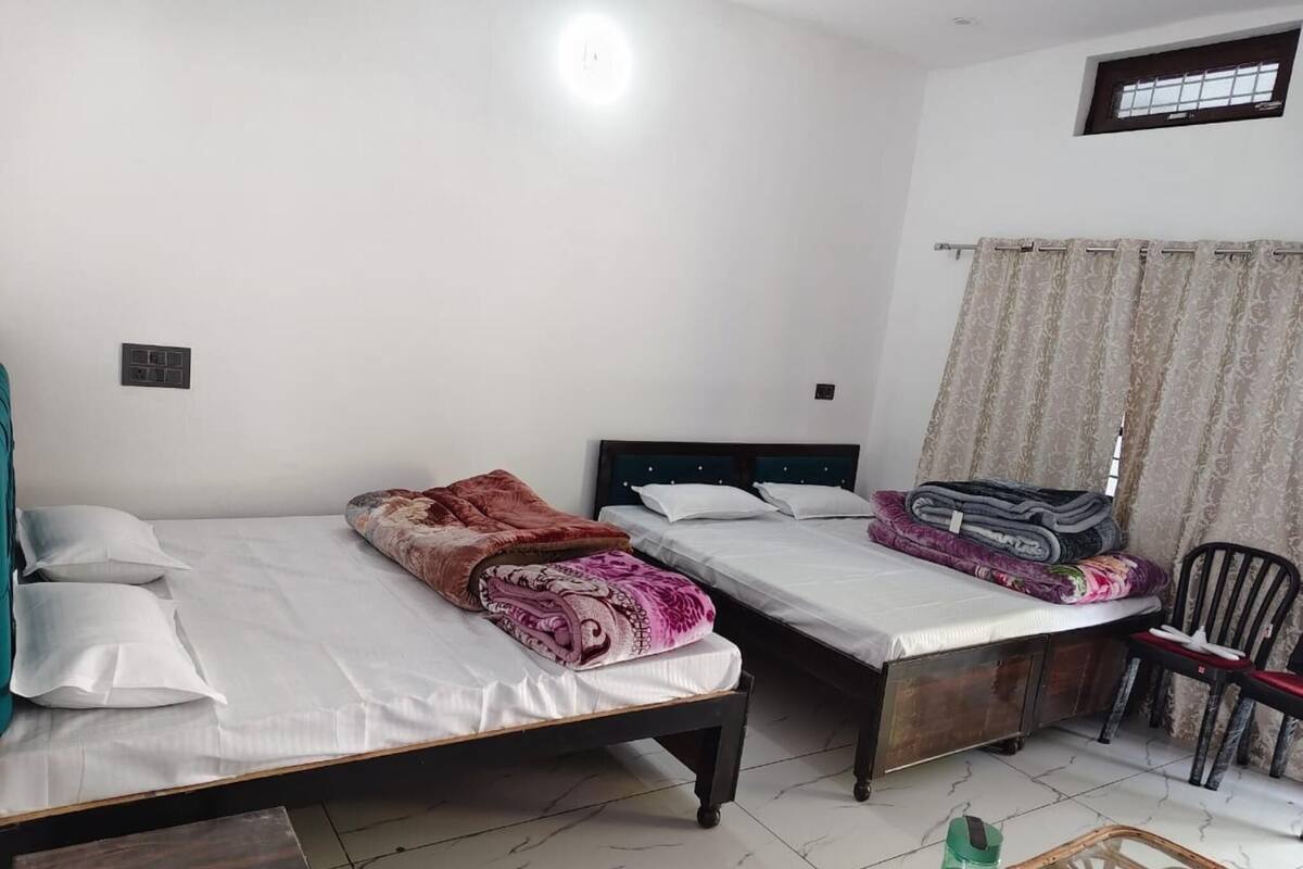 Quarto quádruplo | Camas extras/dobráveis (sobretaxa), roupa de cama