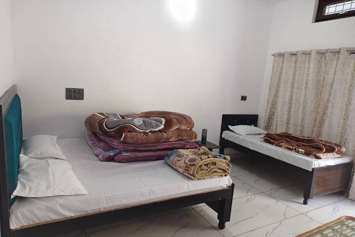 Quarto triplo | Camas extras/dobráveis (sobretaxa), roupa de cama