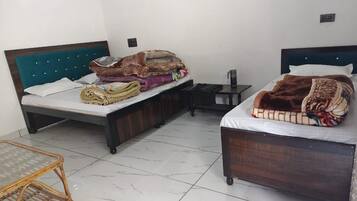 Triple Room | Rollaway beds (surcharge), bed sheets