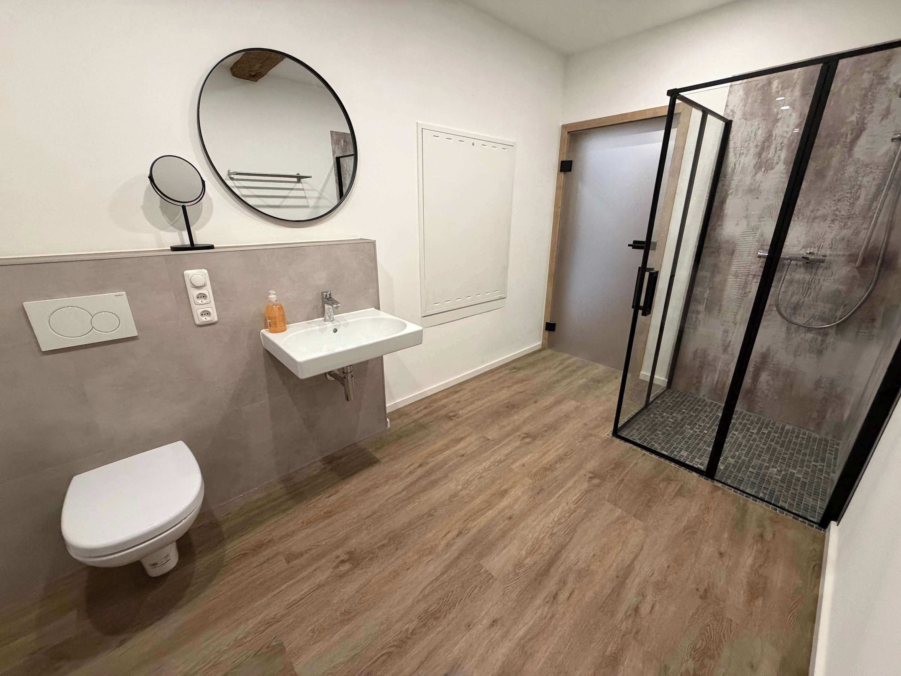 Shower, hair dryer, towels, shampoo