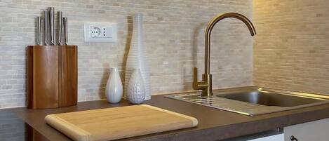 Fridge, stovetop, cookware/dishes/utensils