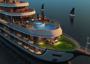 A multi-deck cruise ship with a swimming pool, outdoor seating, and a helipad. - Harmony Boutique Cruise (Tuan Chau)