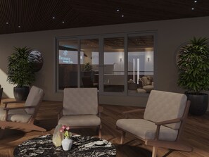 A modern interior with seating, a large window, and a visible sign for 'Harmony Boutique'. - Harmony Boutique Cruise (Tuan Chau)