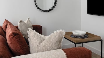 Departamento superior, 1 habitación | Área de sala de estar