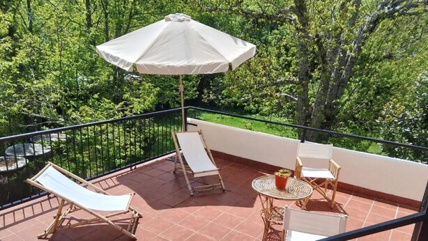 Estudio, balcón, vista al jardín | Áreas de la propiedad