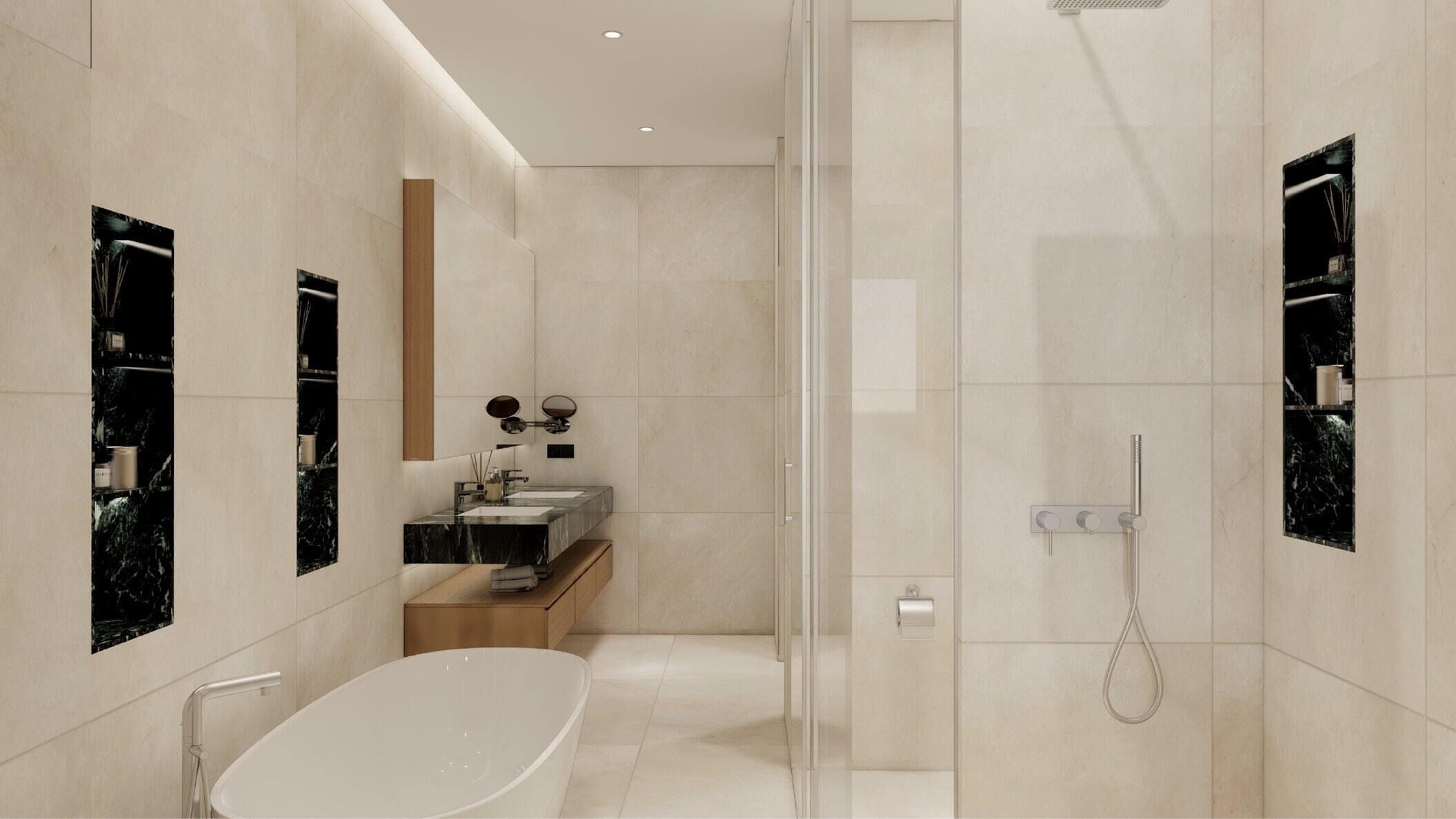 Un baño moderno con una bañera independiente, ducha con mampara de vidrio y un tocador con espejo.