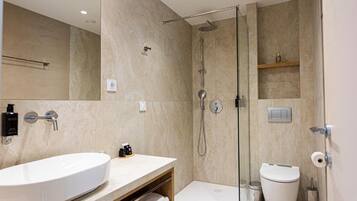 Signature Apartment, Balcony | Bathroom | Shower, hair dryer, slippers, towels