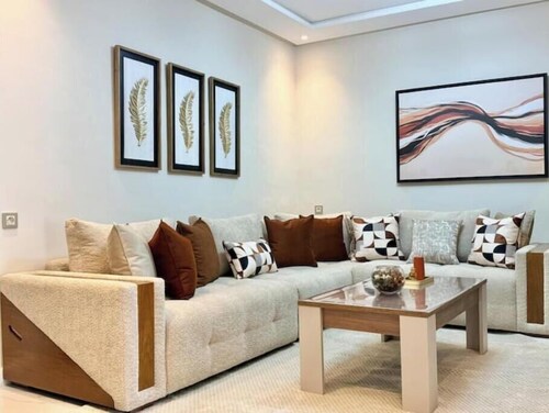 Charming beachfront apartment with balcony.