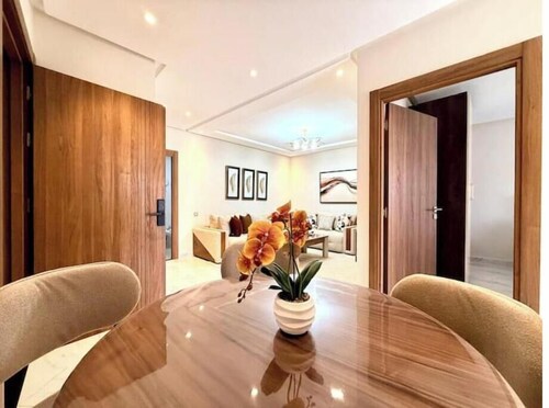 Charming beachfront apartment with balcony.