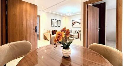 Charming beachfront apartment with balcony.