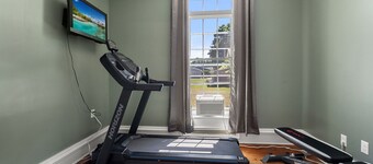 Year-round fun awaits! This pet-friendly retreat sleeps 10 and features 3 king bedrooms, a room with two queens, a heated indoor pool, saltwater hot tub, and TVs with A/C in every bedroom.