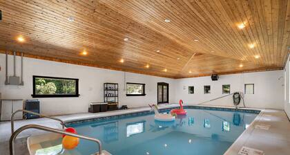 Year-round fun awaits! This pet-friendly retreat sleeps 10 and features 3 king bedrooms, a room with two queens, a heated indoor pool, saltwater hot tub, and TVs with A/C in every bedroom.