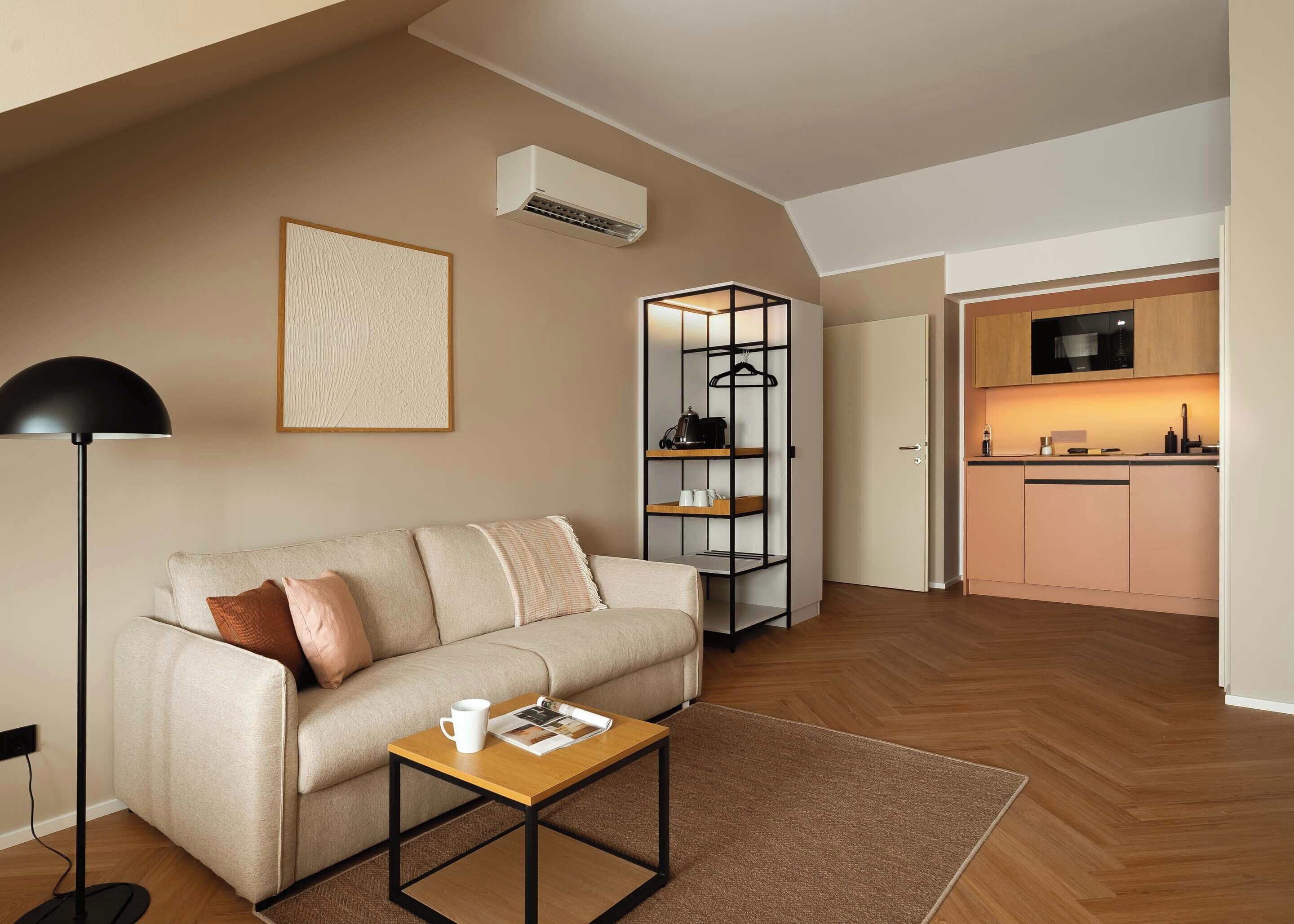 One Bedroom Comfort Suite | Área de sala de estar